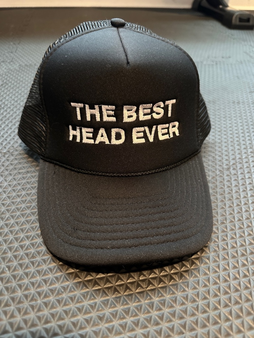 Black Trucker Cap with White Embroidered Slogan